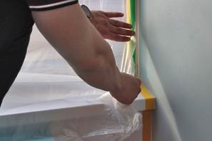 Covering windows with ZOOM Double-Sided Masking Tape