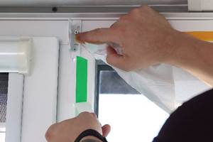 Covering windows with ZOOM Double-Sided Masking Tape