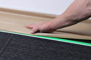 Covering carpets with ZOOM Double-Sided Masking Tape